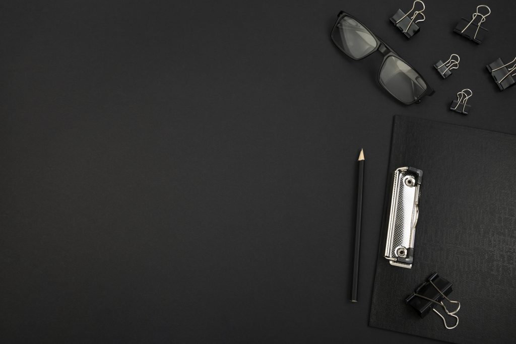 top-view-desk-dark-concept-with-copy-space
